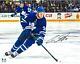 Auston Matthews Maple Leafs Autographed 16x20 Skating With Puck Photograph