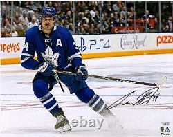 Auston Matthews Toronto Maple Leafs Signed 16 x 20 Blue Jersey Stopping Photo