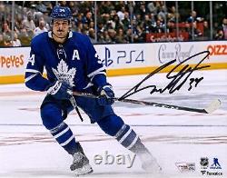 Auston Matthews Toronto Maple Leafs Signed 8 x 10 Blue Jersey Stopping Photo