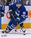 John Tavares Toronto Maple Leafs Signed 8 X 10 Blue Jersey Skating & Puck Photo
